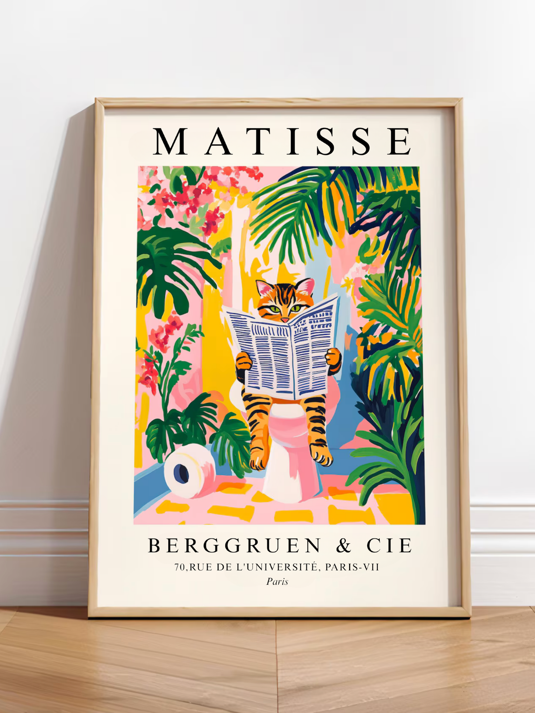 Funny tabby cat on a toilet wall art with pink background in a modern bathroom.