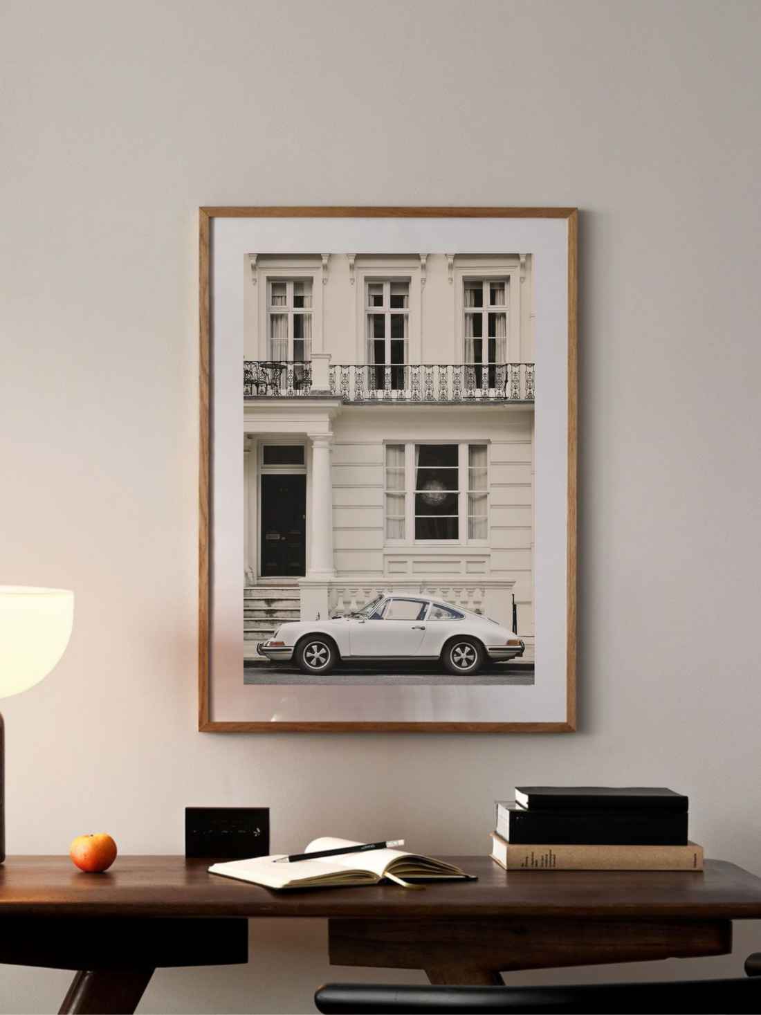 Porsche parked in front of city building