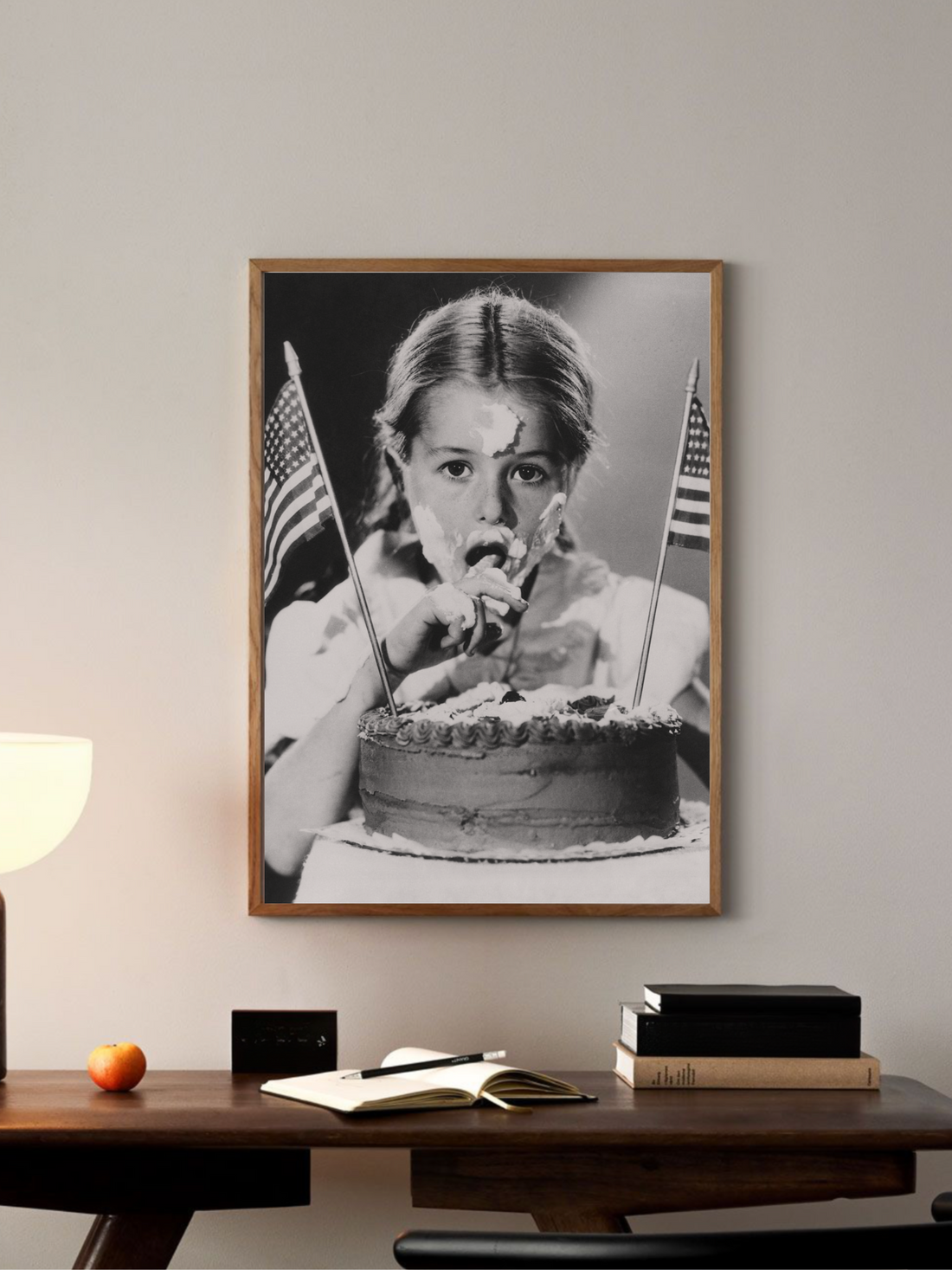Girl eating 4th of July cake in vintage black and white