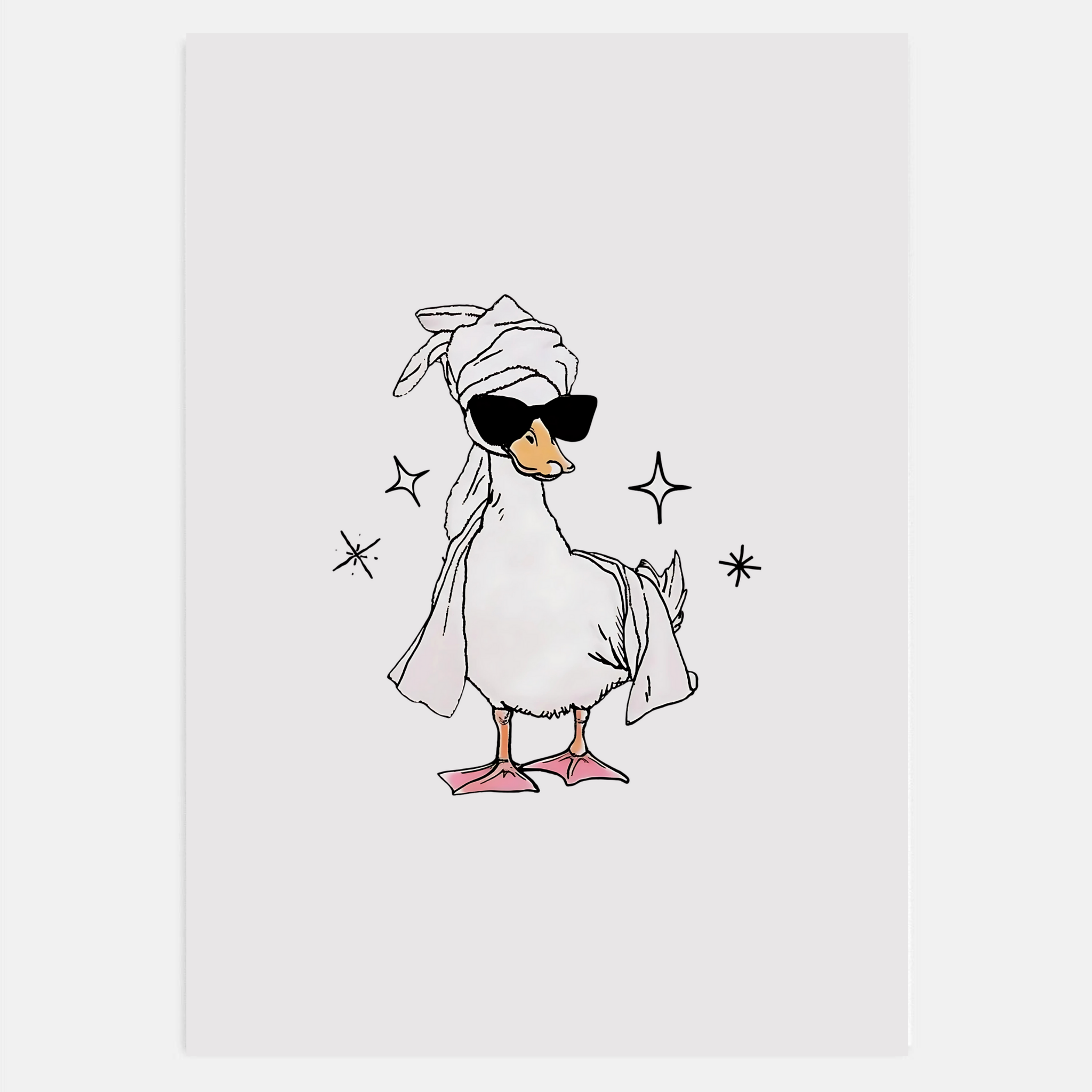 Cute duck wall art hanging in a trendy bathroom with minimal decor.