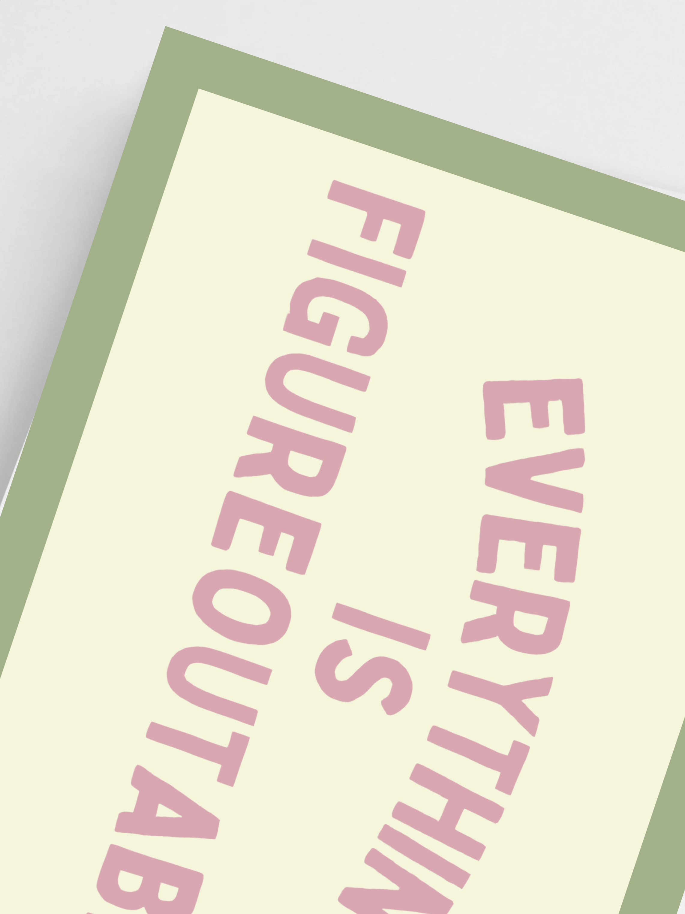 Close-up of soft dopamine decor print with Everything Is Figureoutable text.