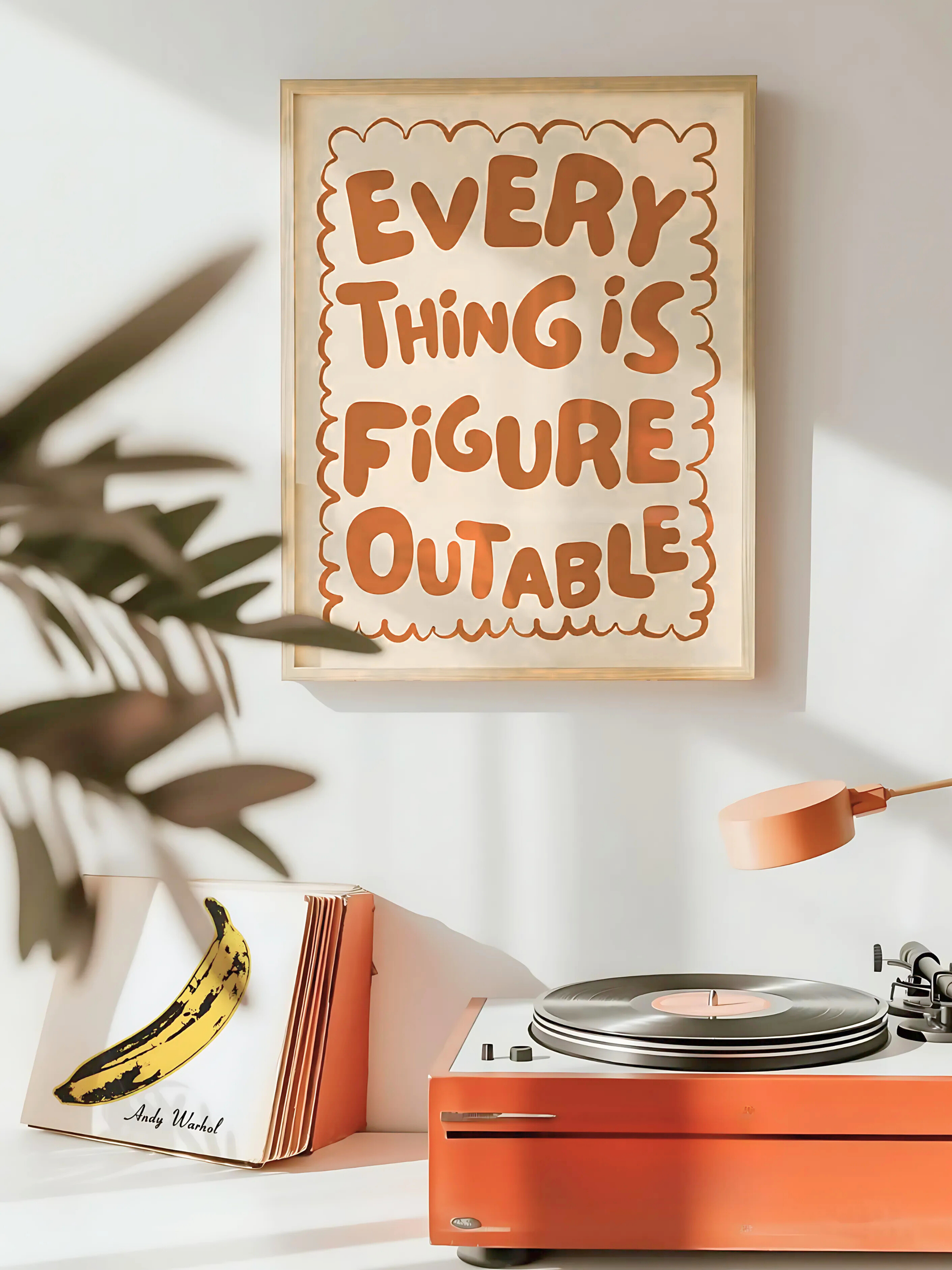 Boho motivational wall art styled in a cozy bedroom with plants.
