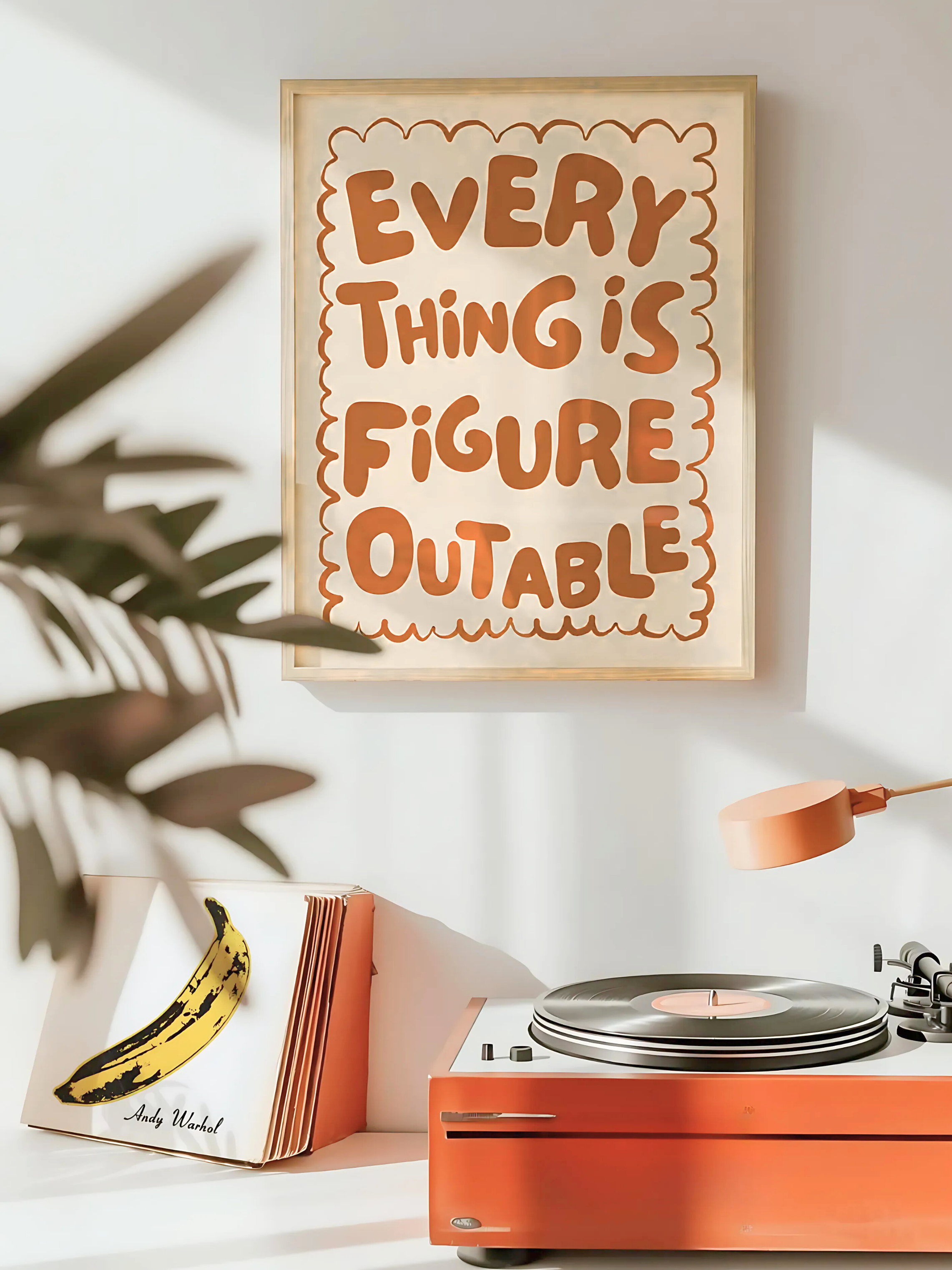 Boho motivational wall art styled in a cozy bedroom with plants.