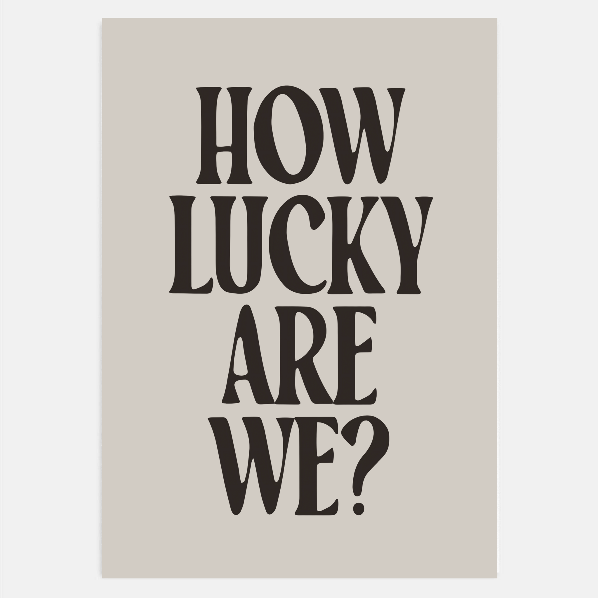 How Lucky Are We black typography poster on a bedroom wall with retro decor.