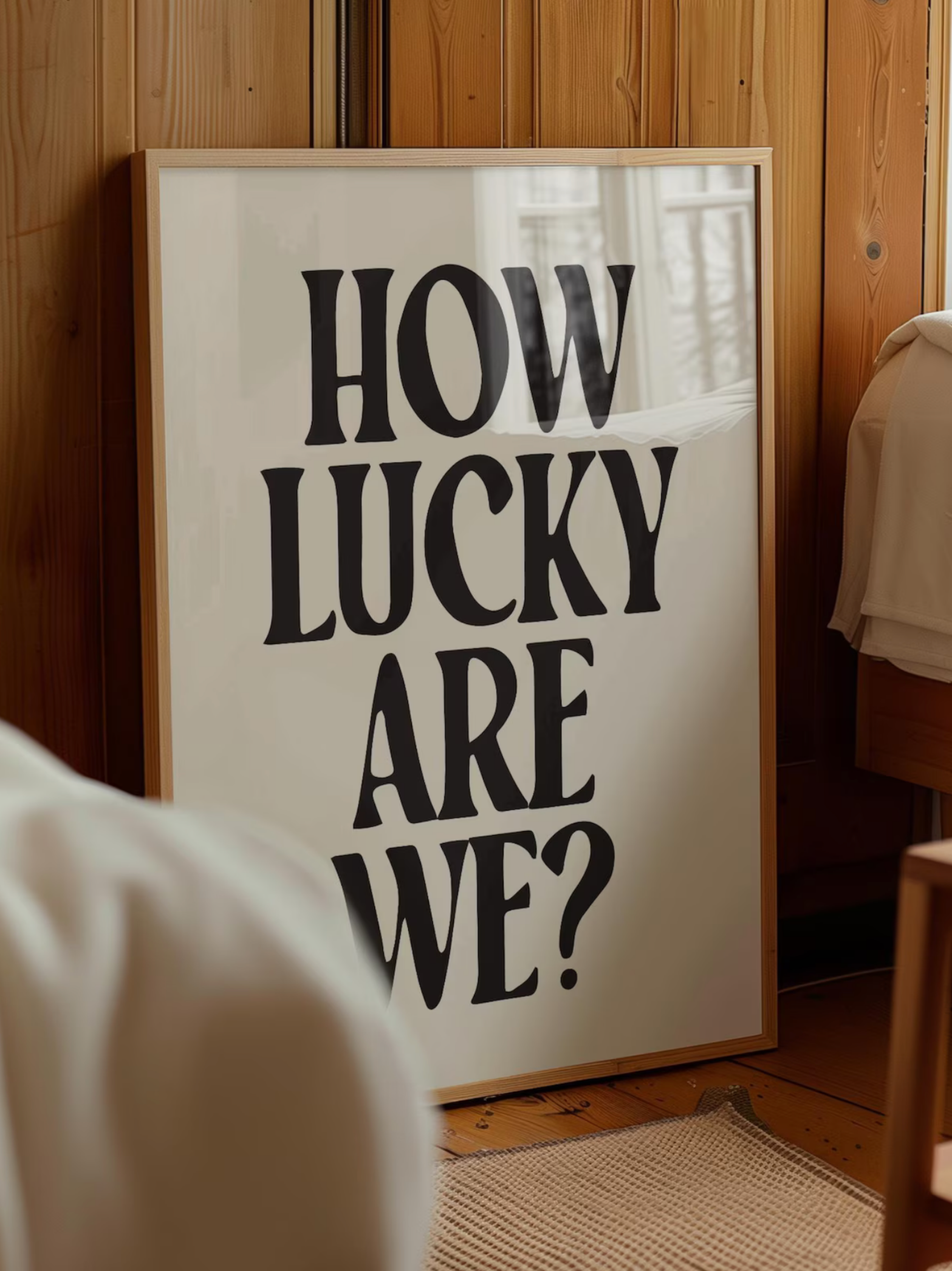 Trendy aesthetic How Lucky Are We wall art styled in a cozy dorm room.