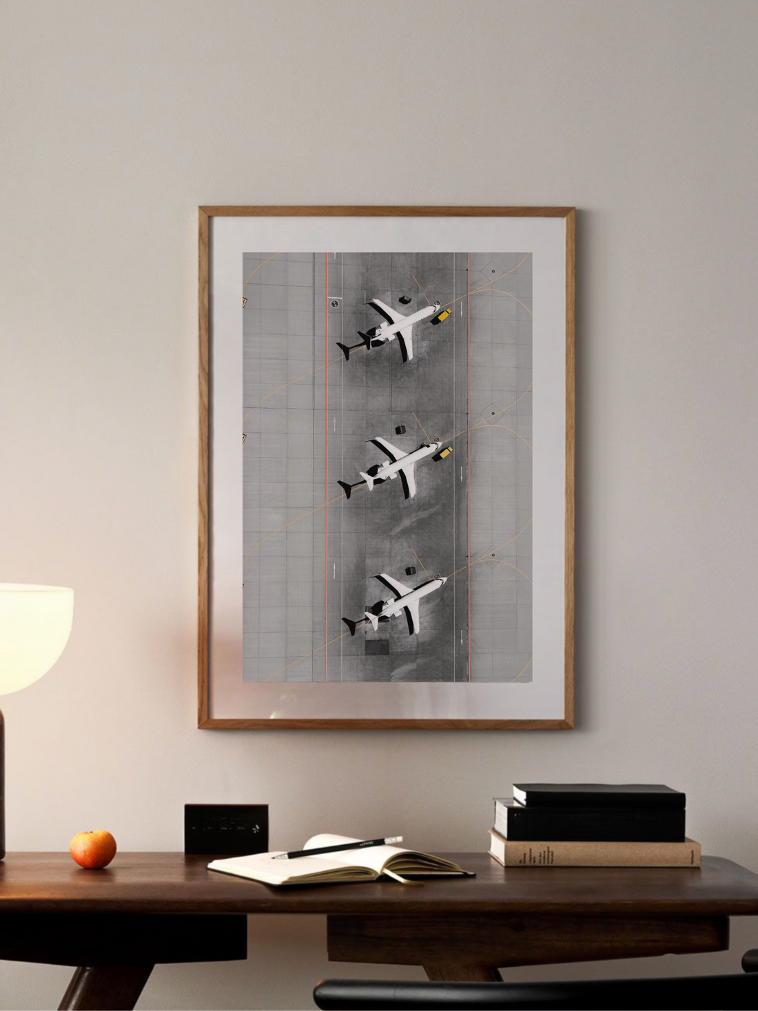 Overhead view of three airplanes on airport runway