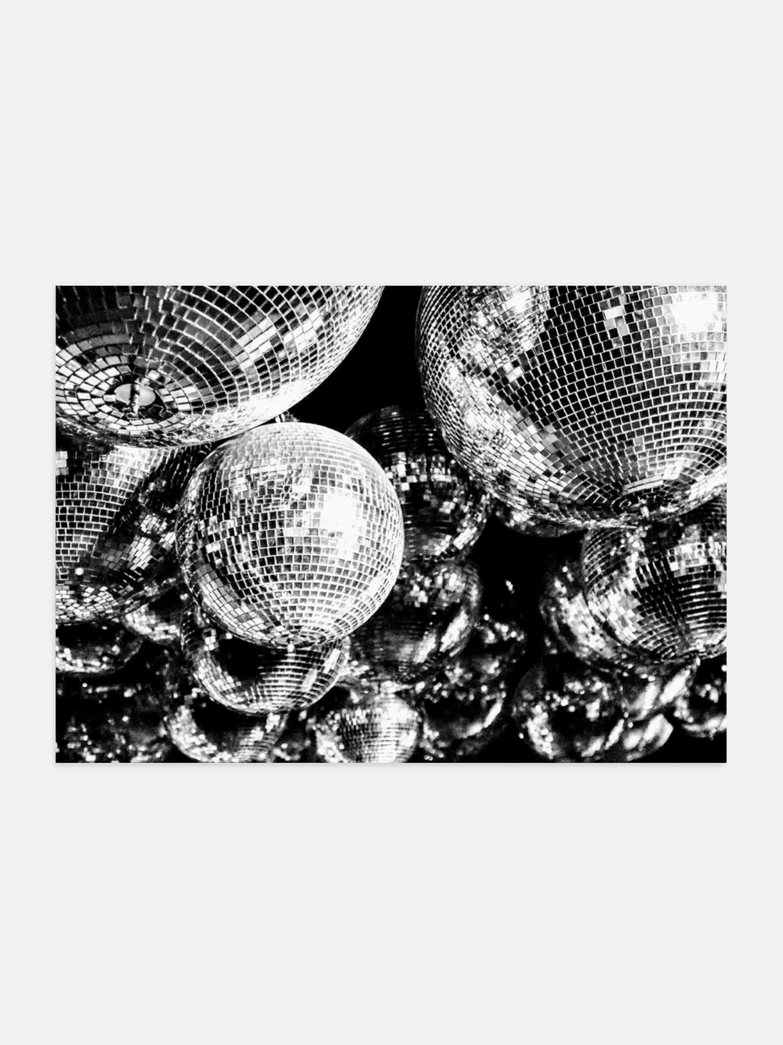 Close-up of disco balls with a black and white filter