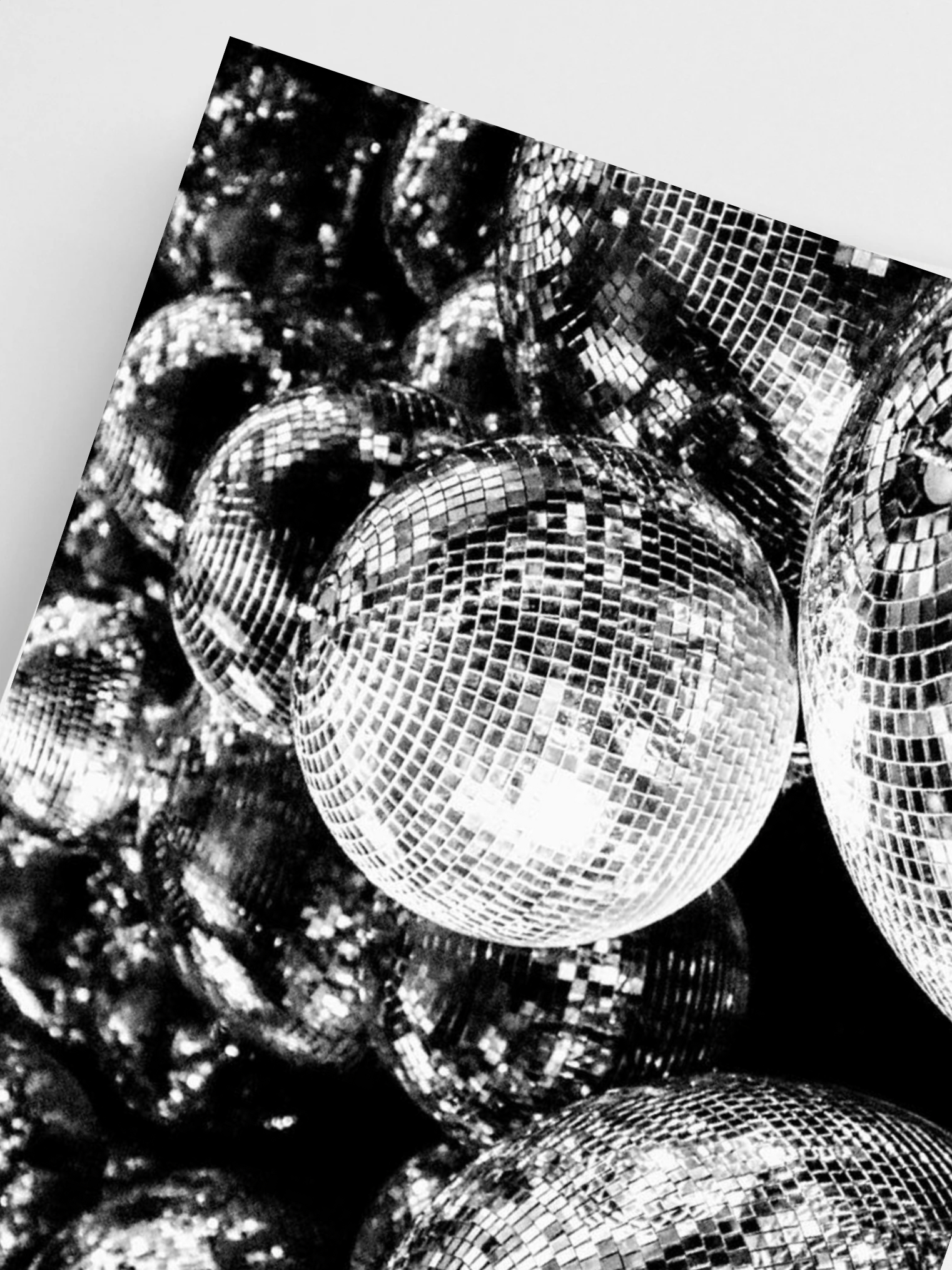 Close-up of disco balls with a reflective surface