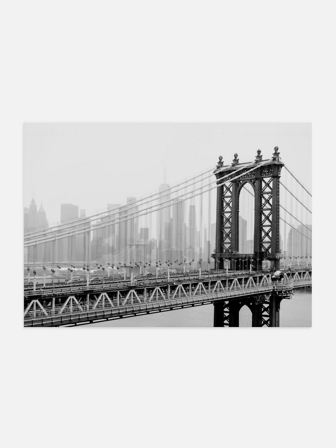 Manhattan Bridge over East River in black and white