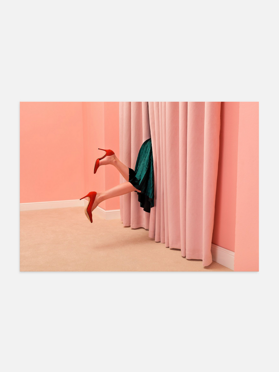Woman in velvet dress and red heels climbing out window