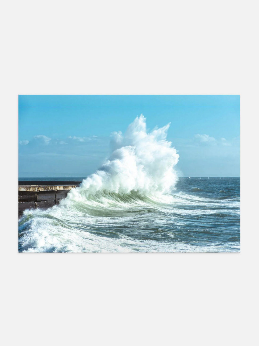 Huge ocean wave crashing on dock in high contrast