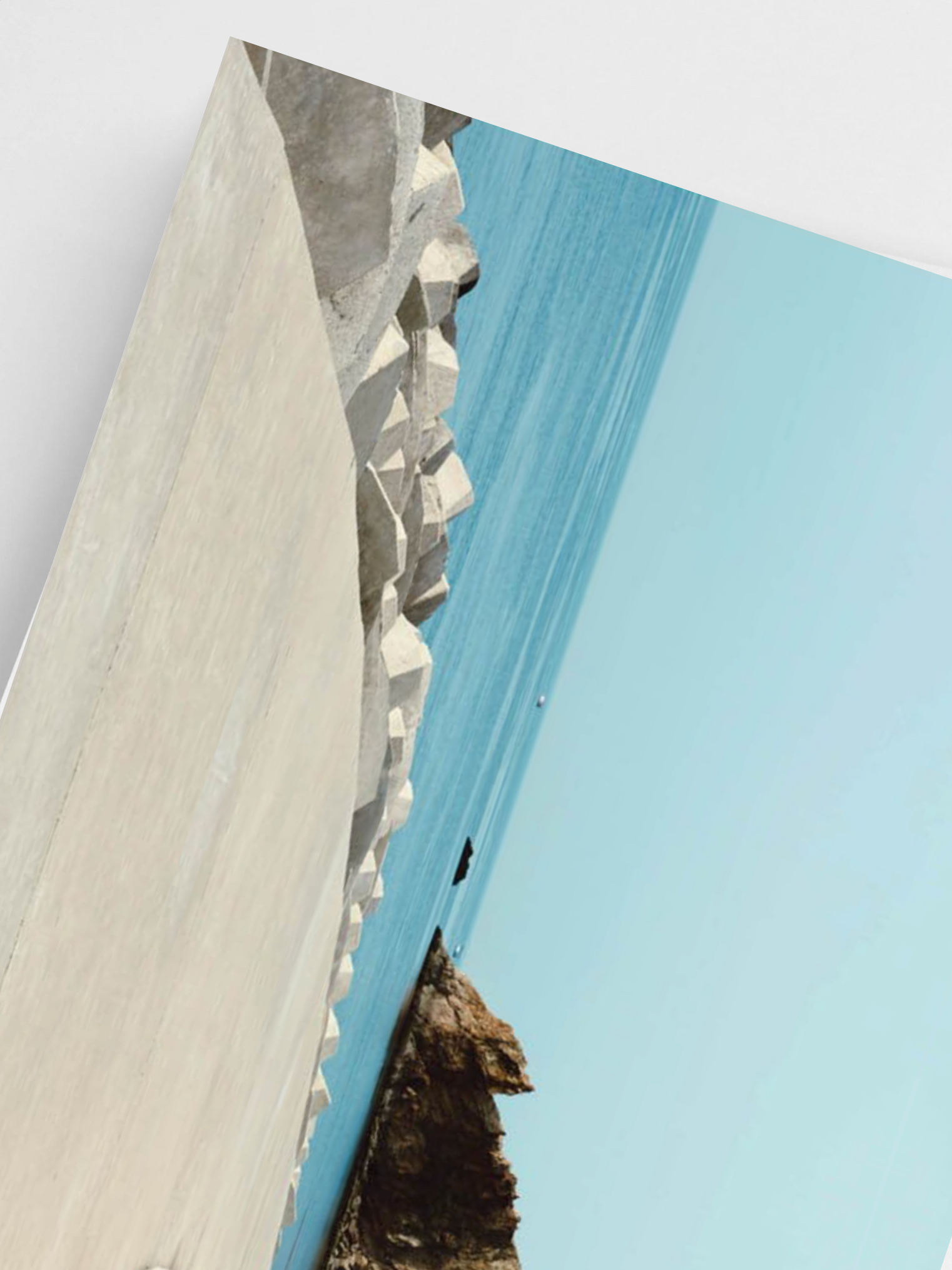Close-up of a poster with a geometric pattern on a white background