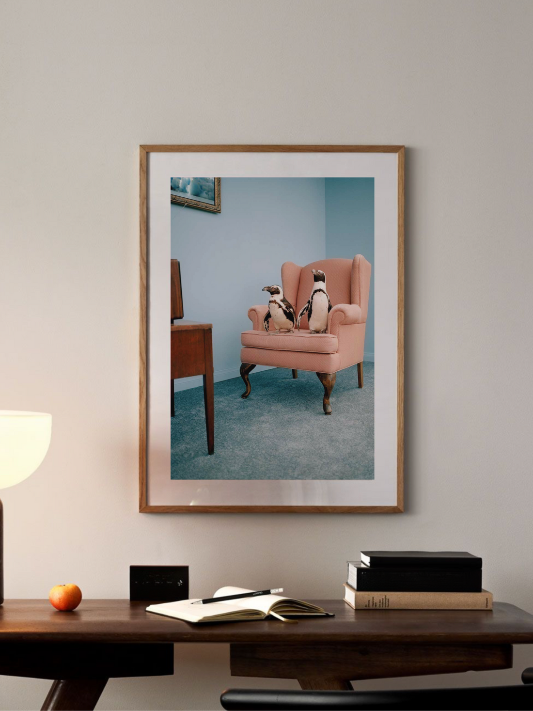 Two penguins watching TV in surreal living room